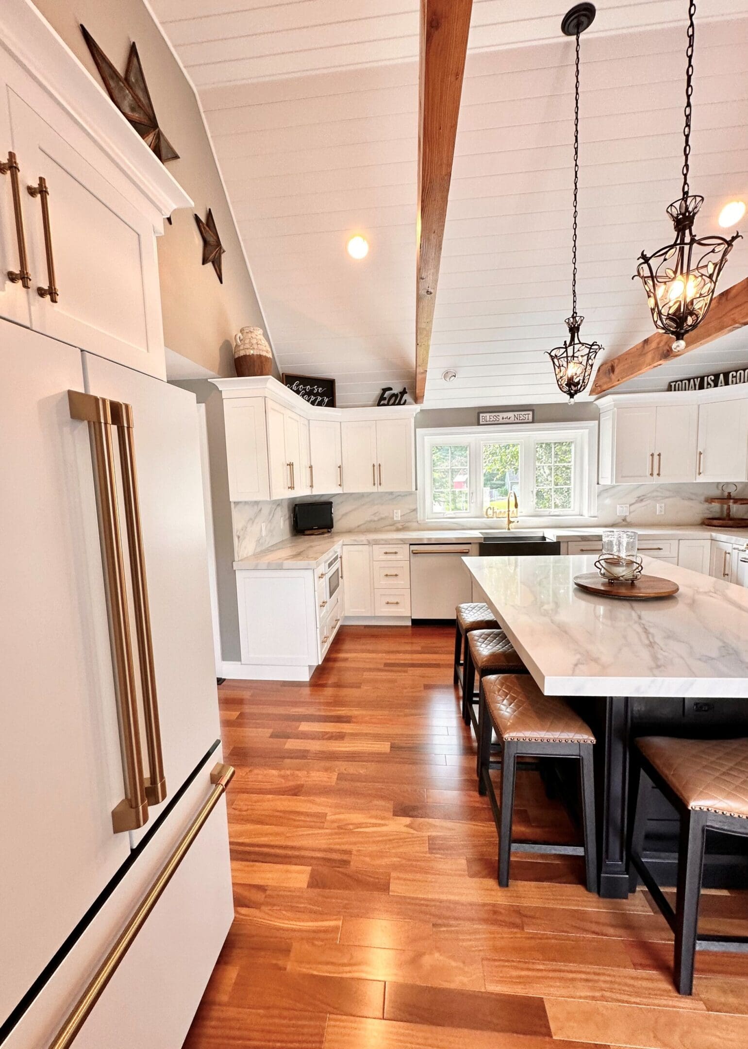 a room with dining table and fridge