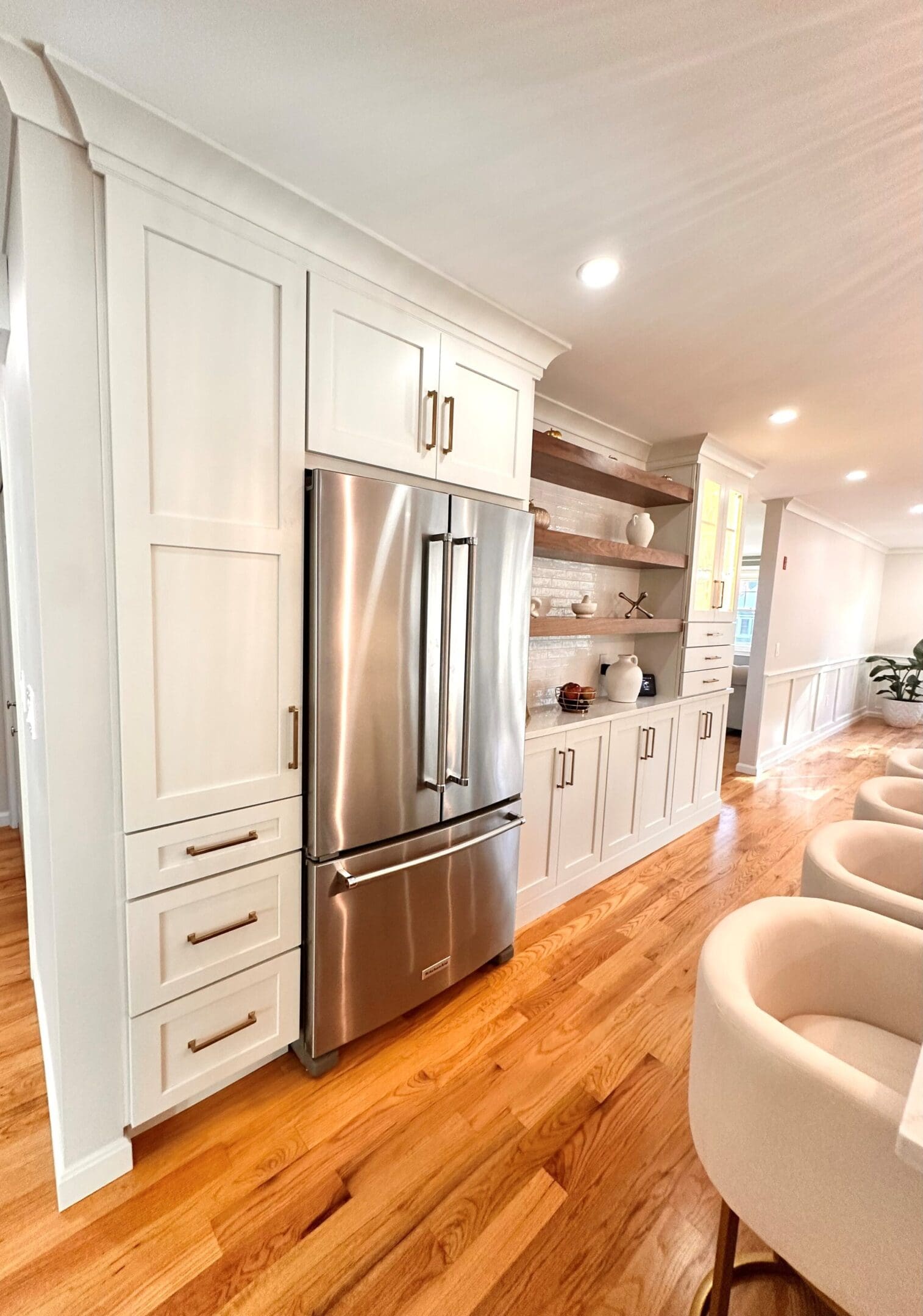 a bridge near the white cabinets