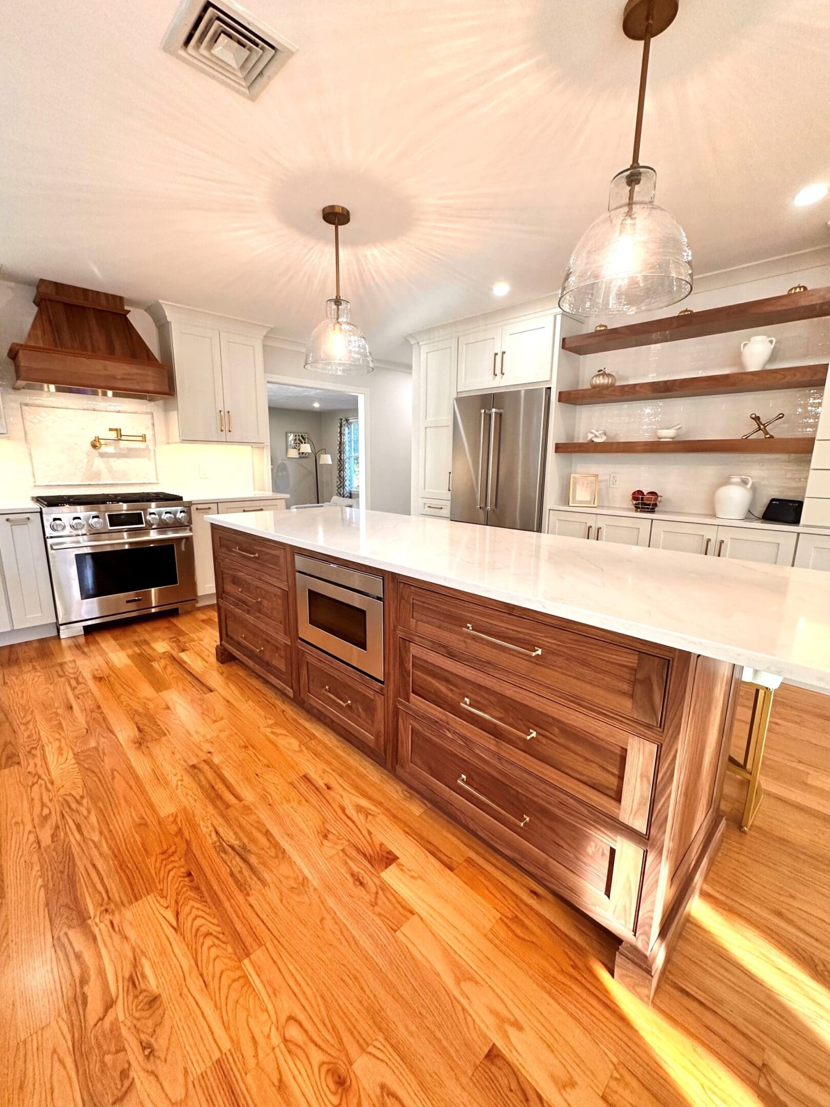 kitchen with island hood shelves