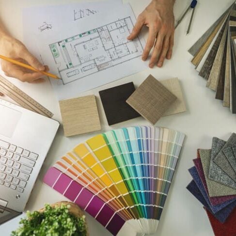 A person working on some color samples